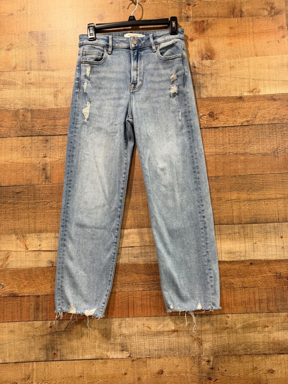 Light Wash Straight Leg Jeans with Distressed Hem
